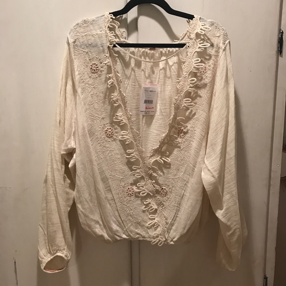 Free people, desert sands embroidered top. NWT. L minor flaws